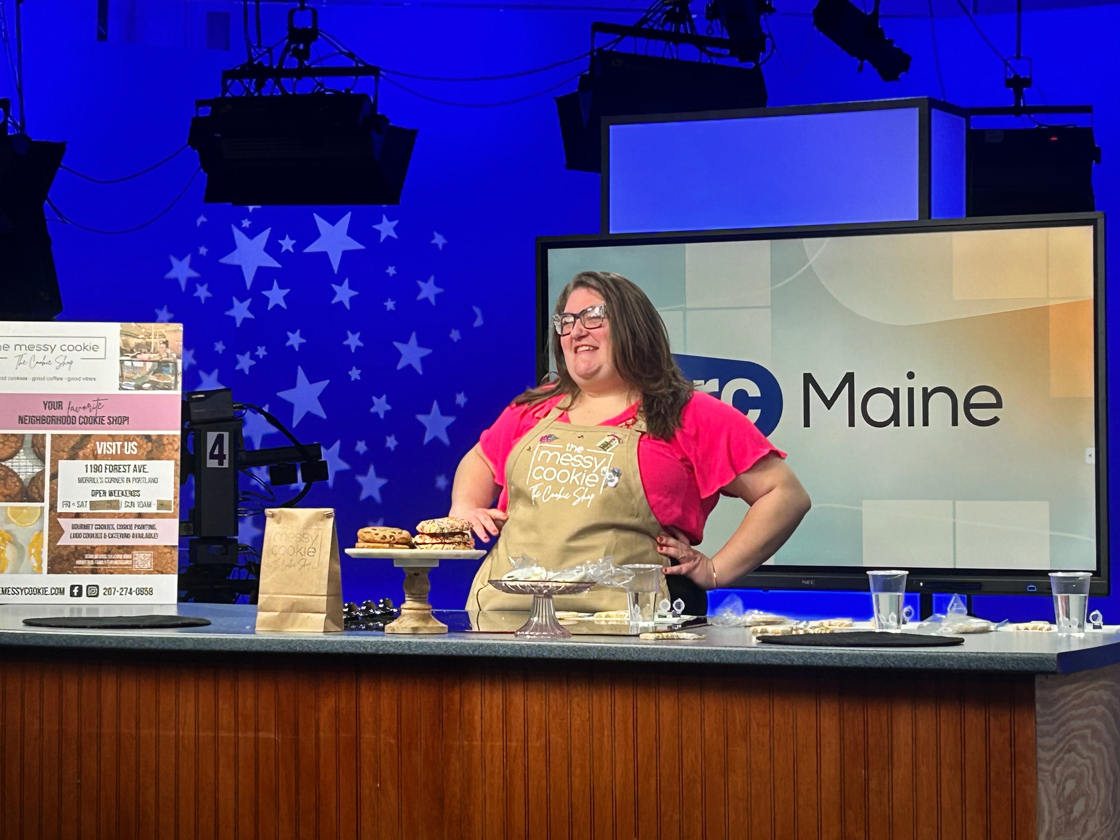 Load video: The Messy Cookie joins Jeff and Steph on FOX23'S ARCMaine and demonstrates how to paint sugar cookies in celebration of Mardi Gras!